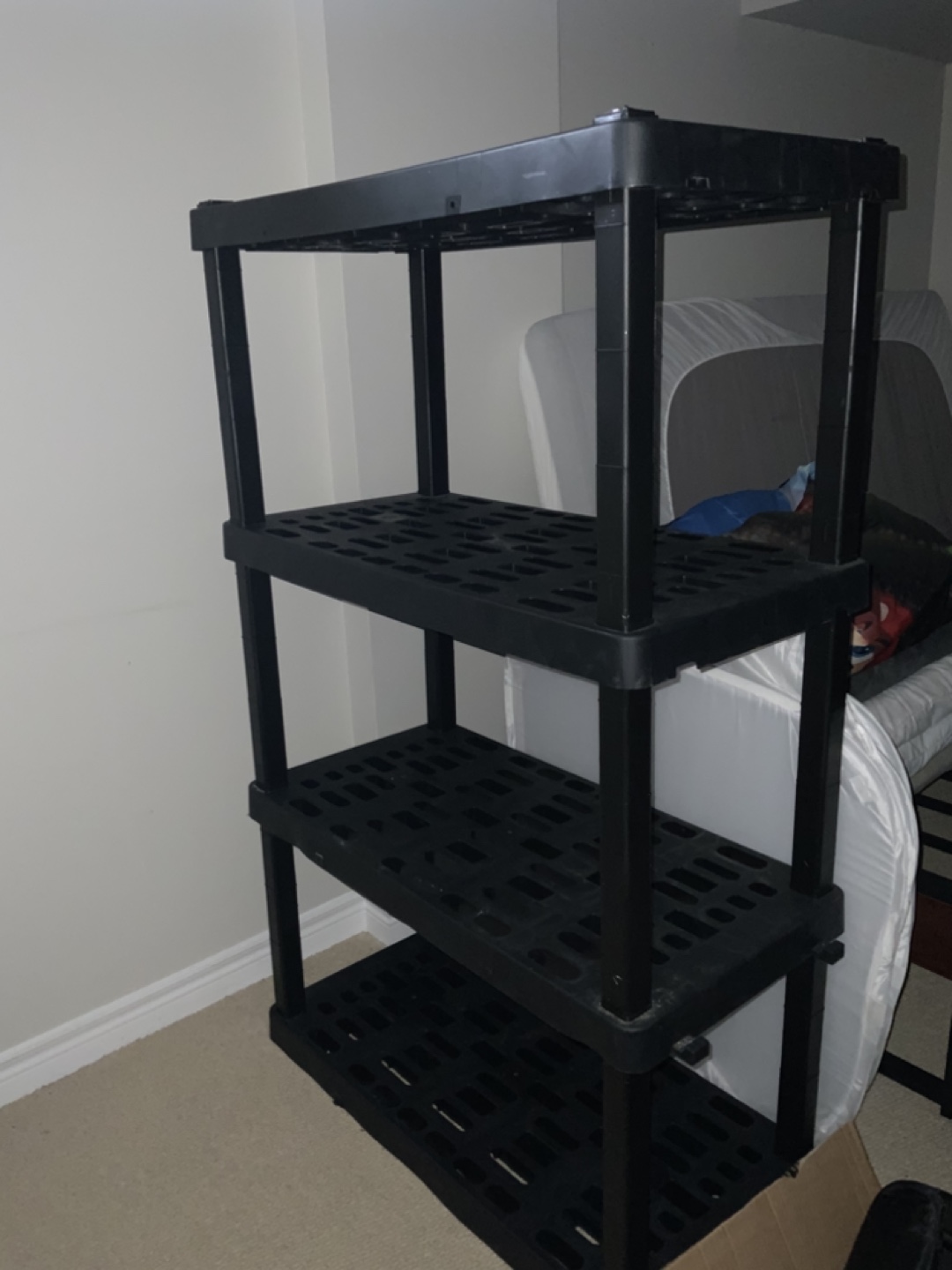 Black Plastic 4-Tier Shelving Unit
