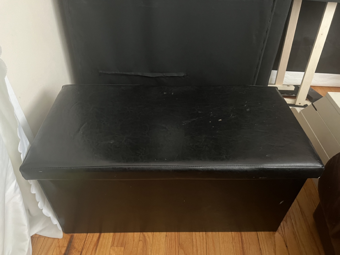 Brown Leather Recliner, Black Storage Ottoman, and Black Futon - photo 4