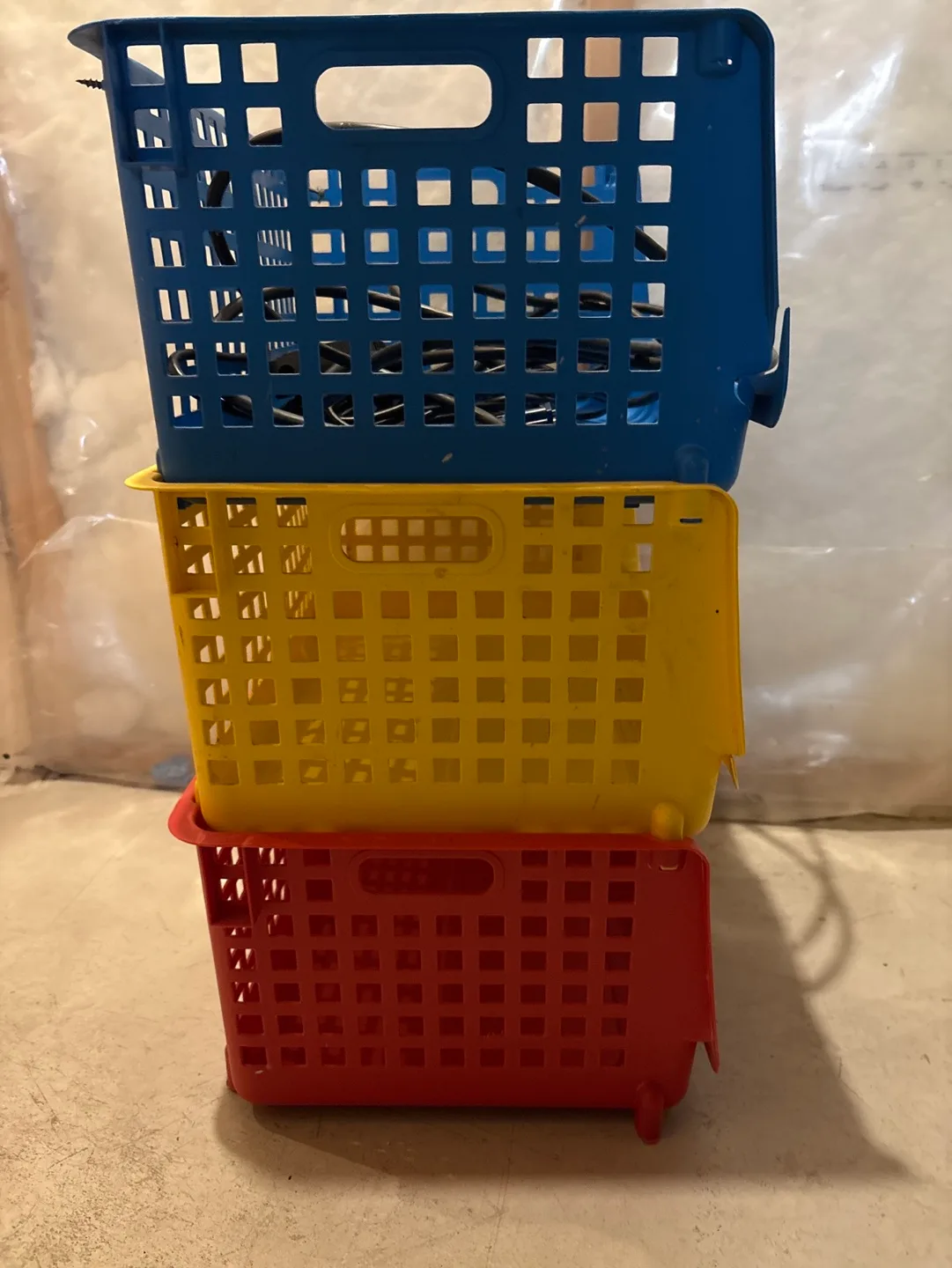 Set of three stackable plastic storage bins image indicator(2)