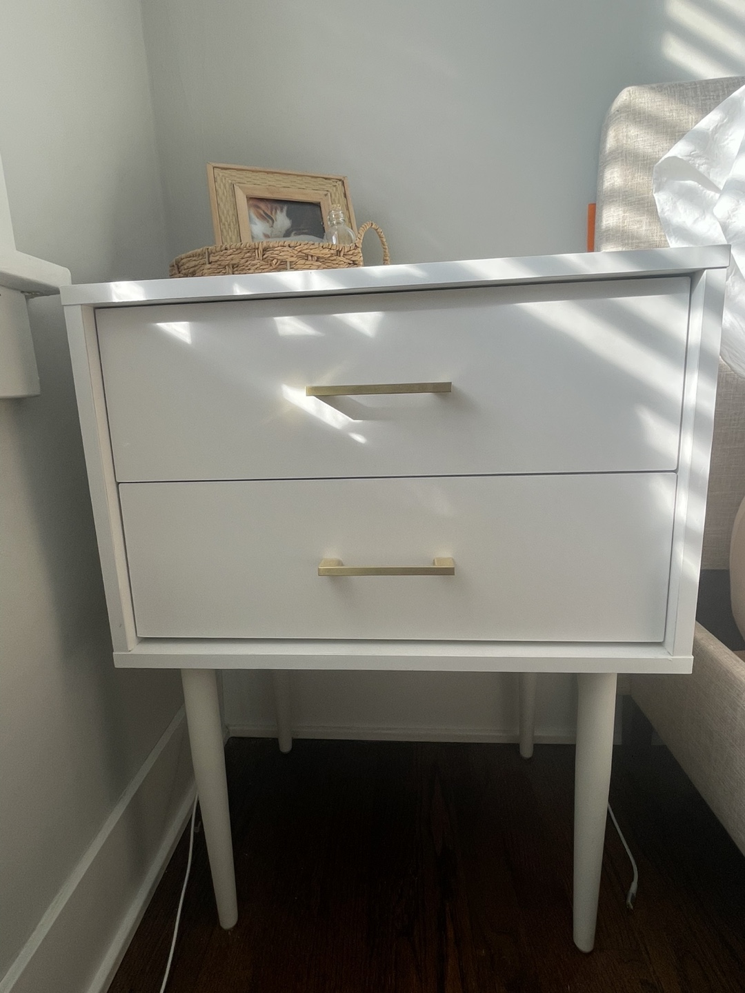 White Two-Drawer Nightstand with Gold Hardware