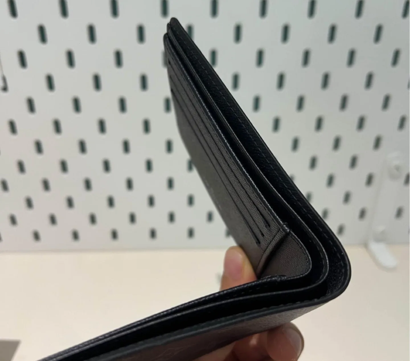 LOUIS VUITTON Black Leather Bifold Wallet image indicator(3)