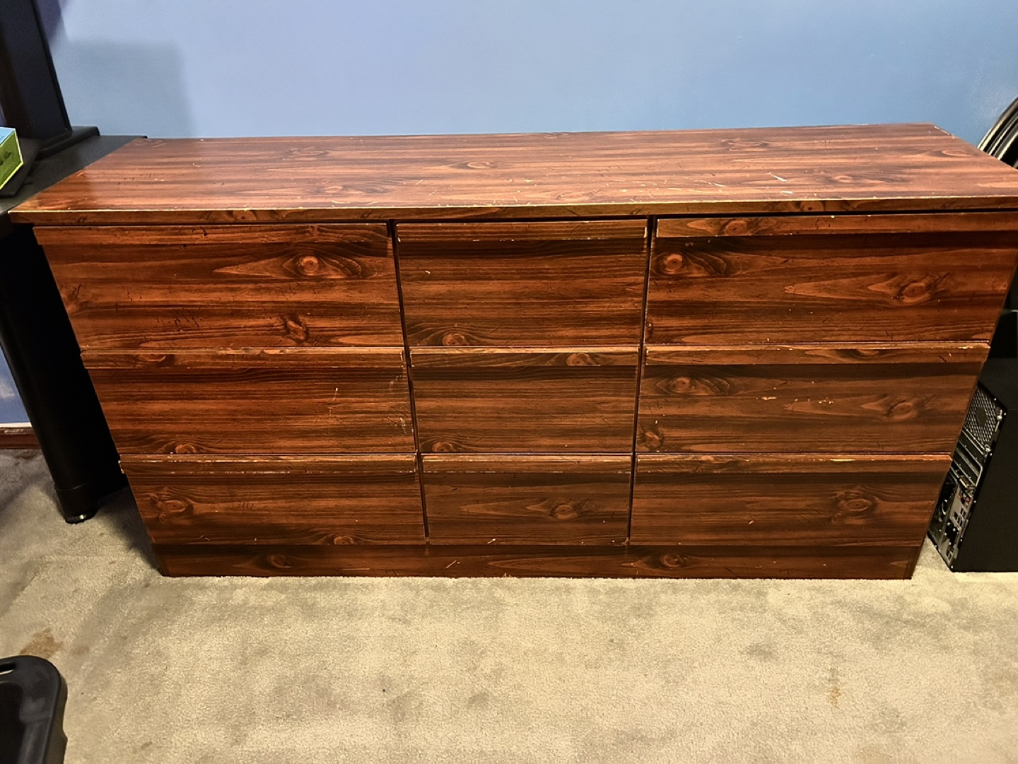 Dark brown dresser with six drawers