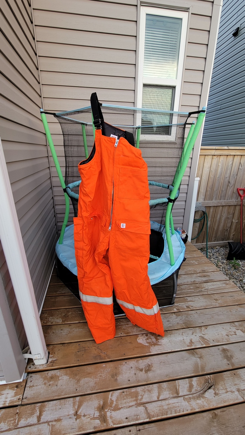 High-visibility orange work overalls