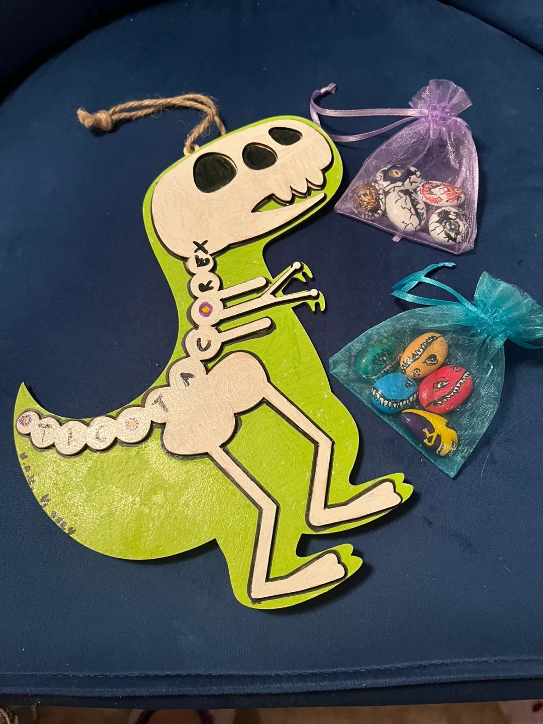 Hand-painted Dinosaur Skeleton with Painted Rocks image indicator(2)