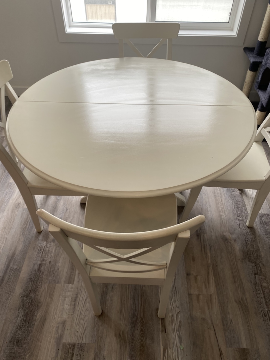 White Round Dining Table and Four Chairs Set
