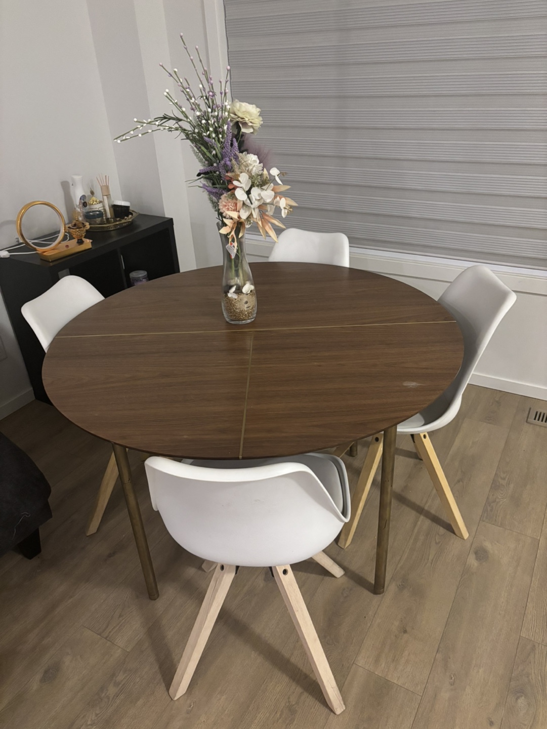 Round dining table and four chairs