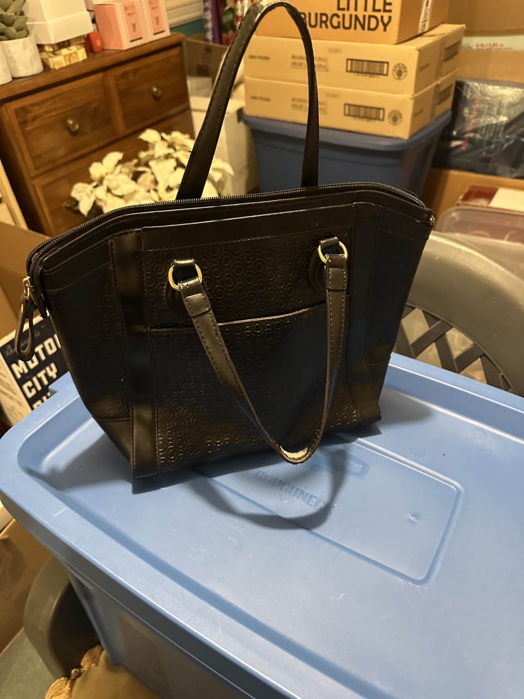 Black embossed satchel handbag