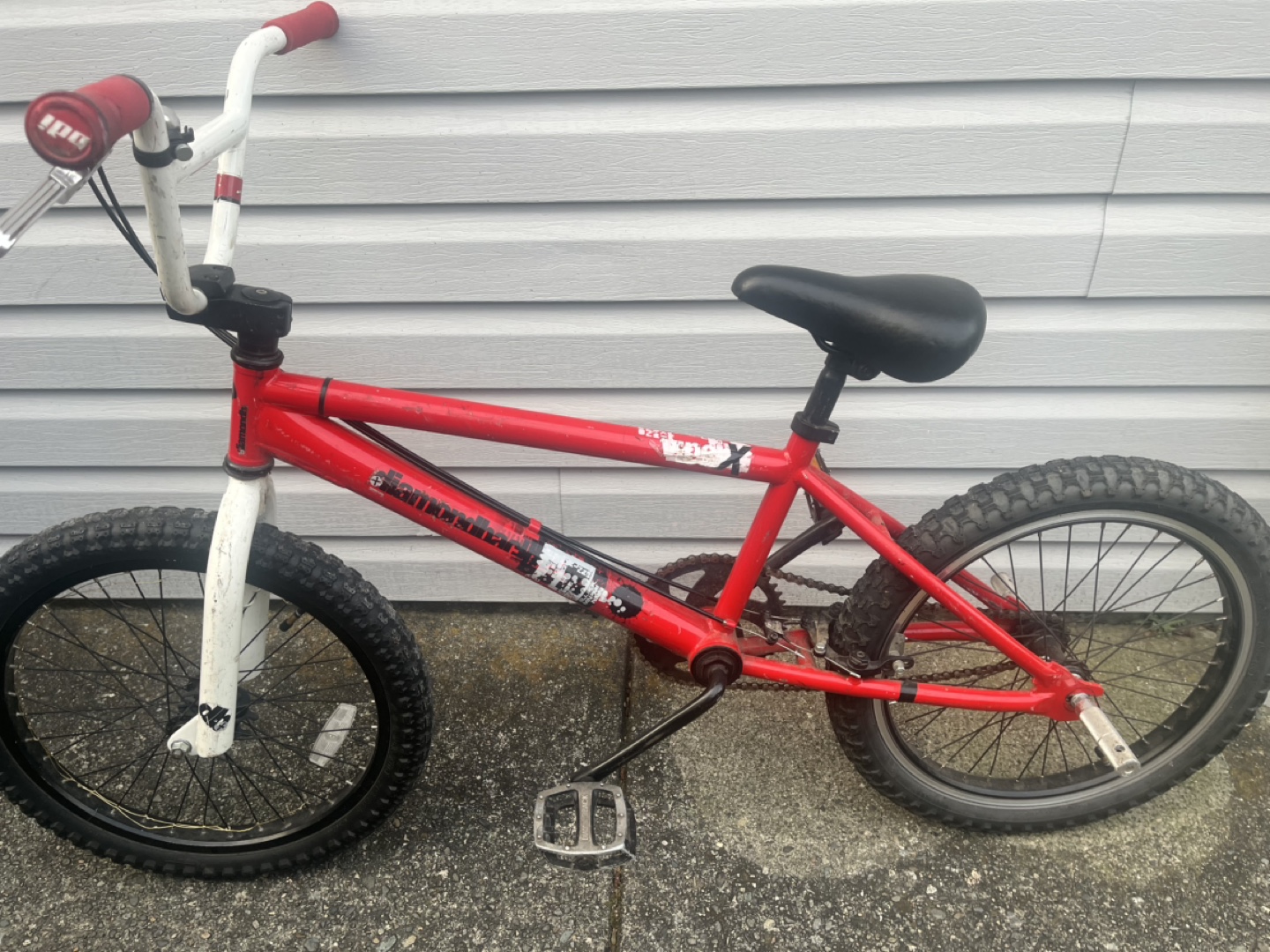 Used Red and White BMX Bike