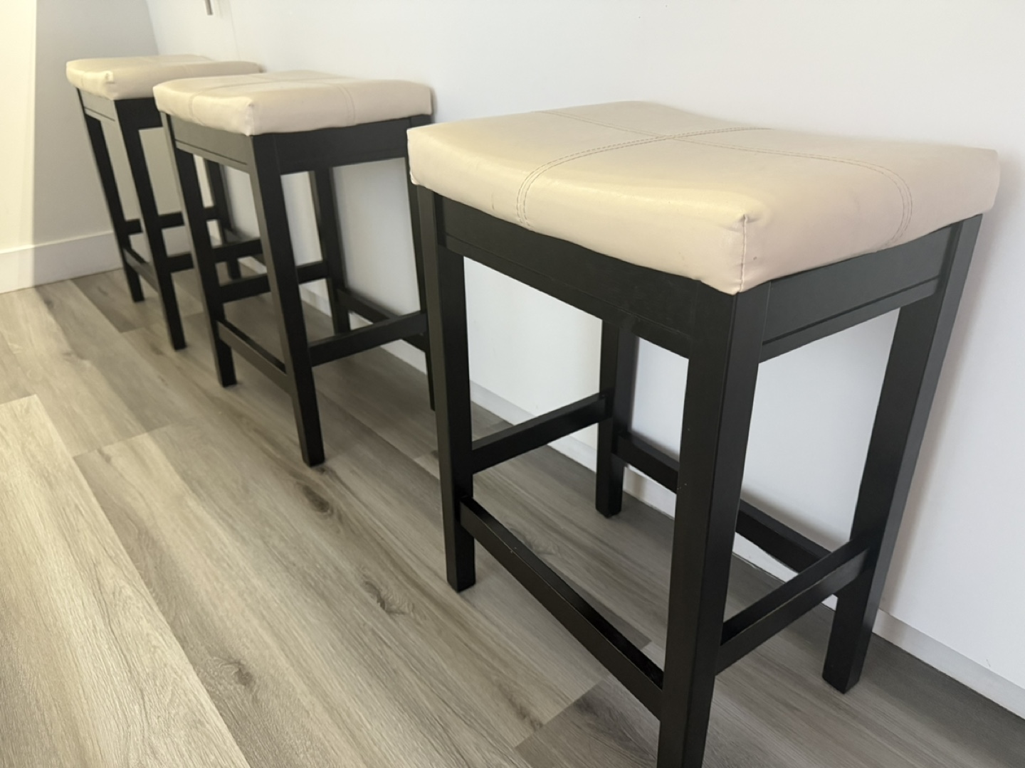 Set of three kitchen counter stools