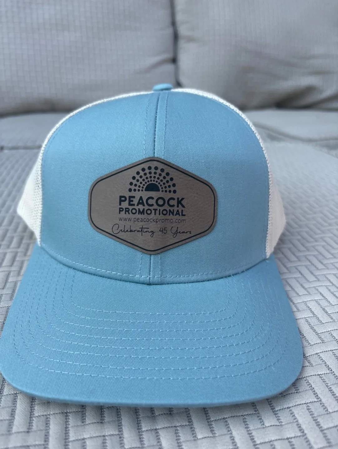 Peacock Promotional 45th Anniversary Trucker Hat thumbnail