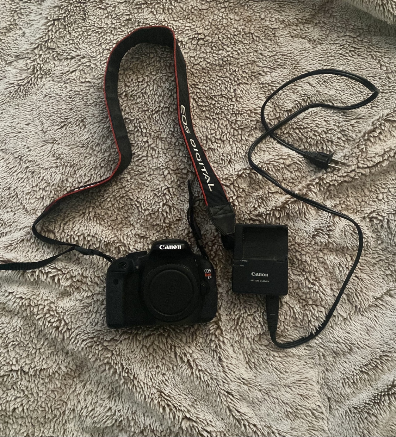 Canon EOS Rebel T3i DSLR Camera with Charger and Strap
