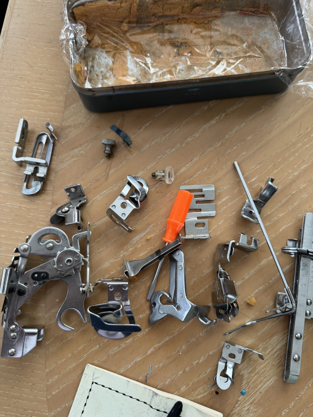 Vintage Sewing Machine Attachments in Tin - photo 2