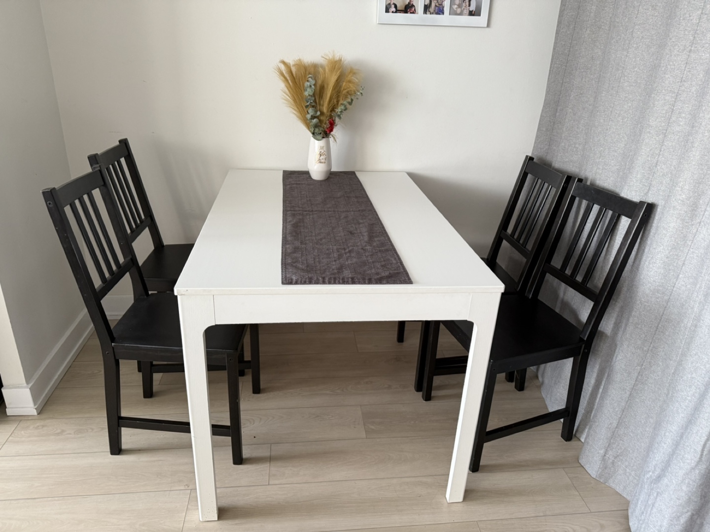Extendable White Dining Table with Four Black Chairs - photo 2