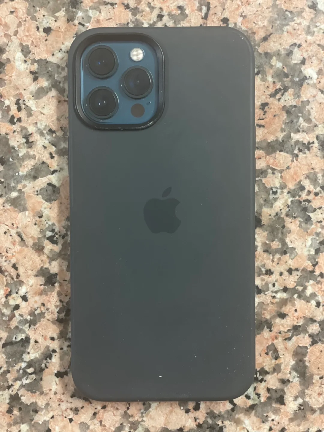 iPhone 12 Pro Max with Black Apple Silicone Case and USB-C Cable image indicator(2)