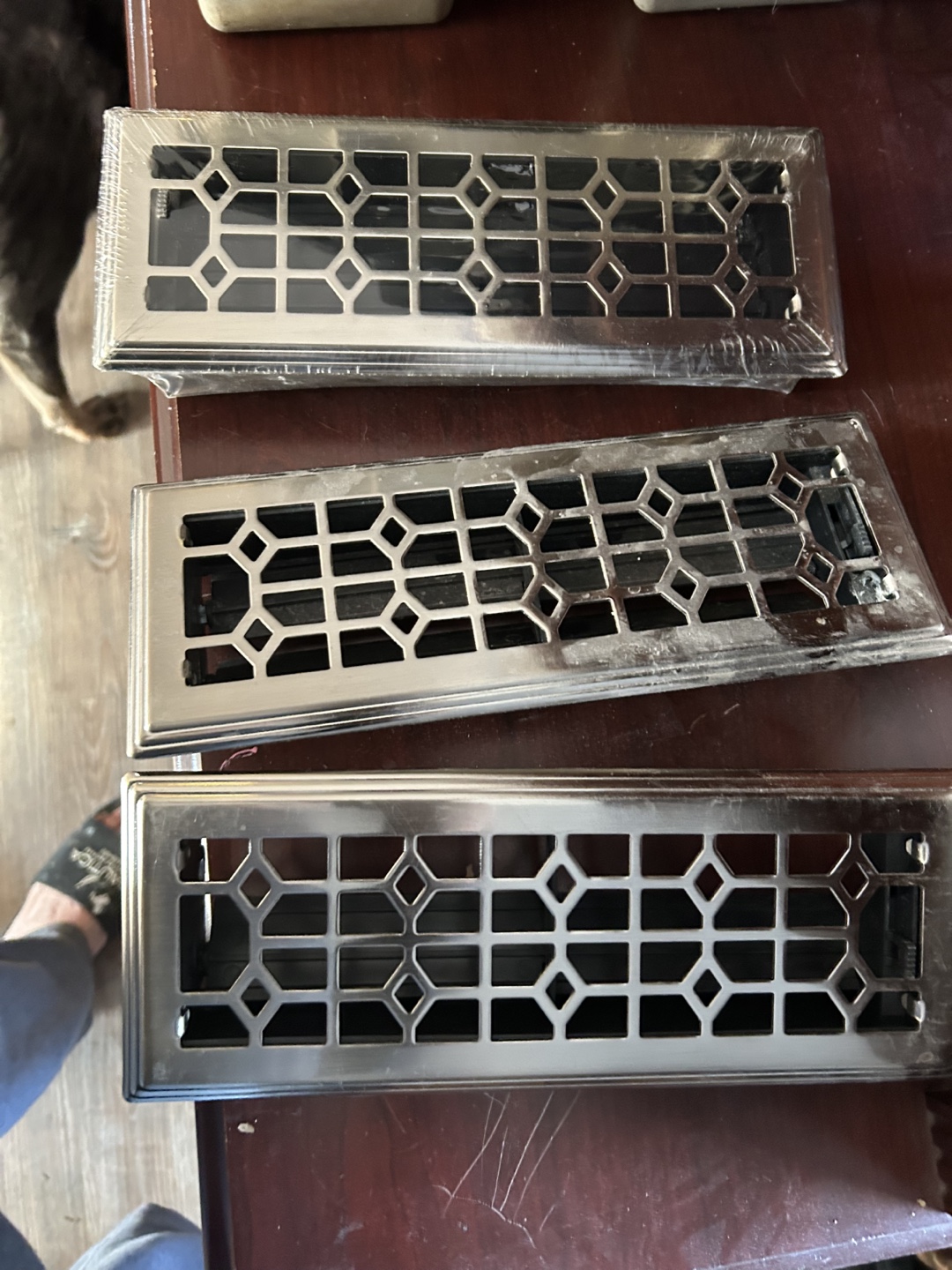 Three Nickel-Plated Register Vents