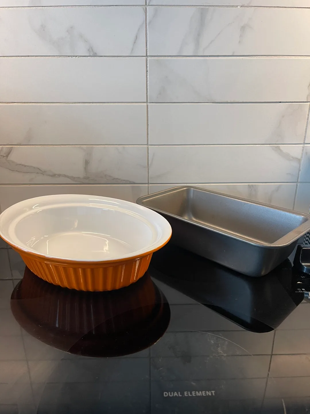 ceramic baking dish and grey metal loaf pan thumbnail