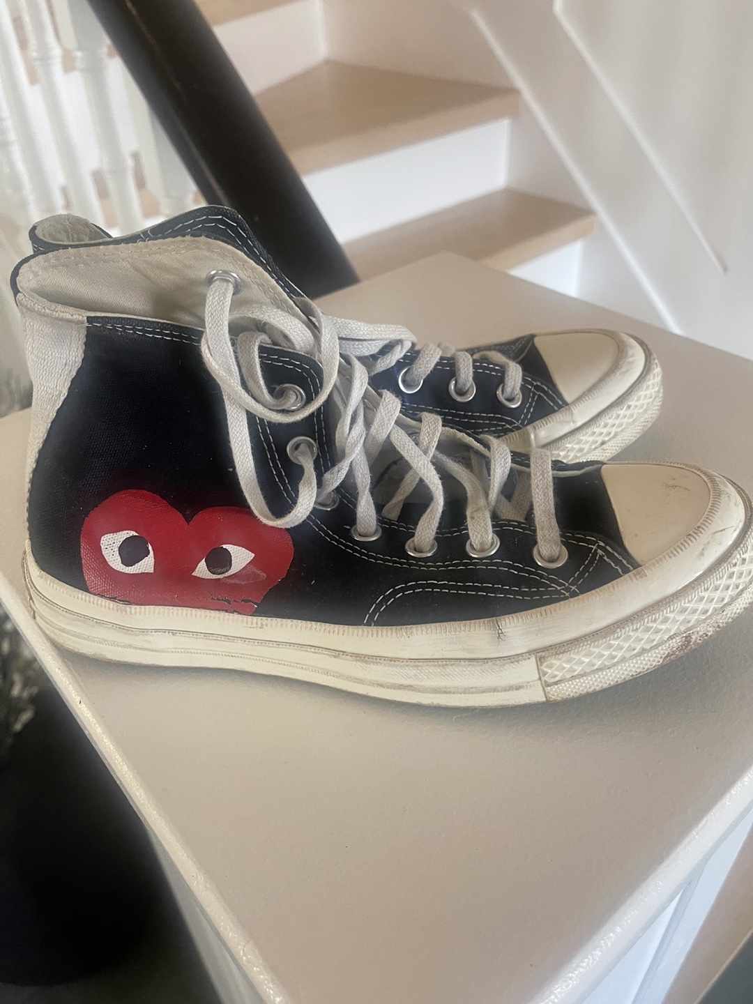 CDG converse large emblem high top canvas .