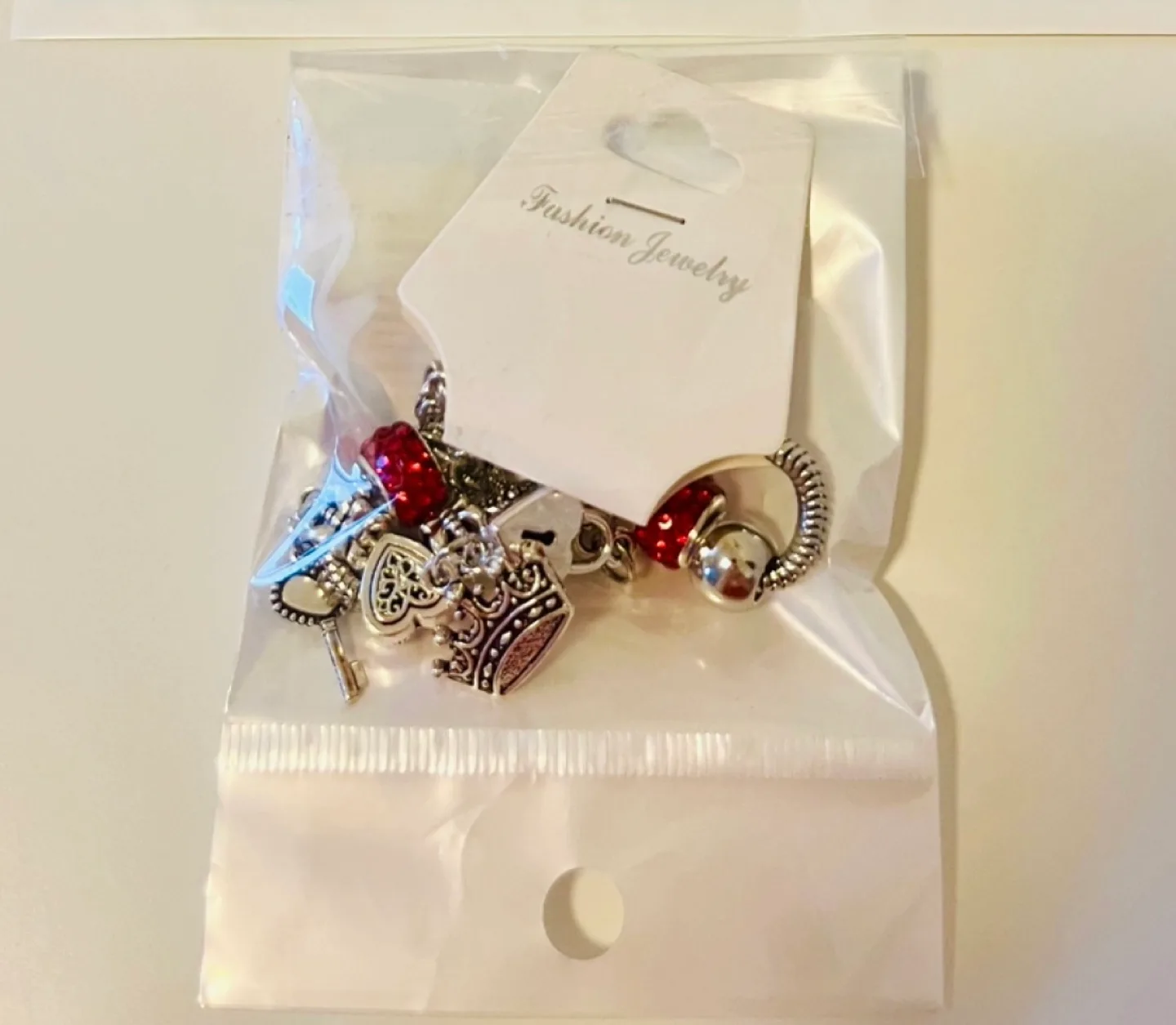 Charm Bracelet with Red Beads and Crown, Key,Heart Charms image indicator(3)