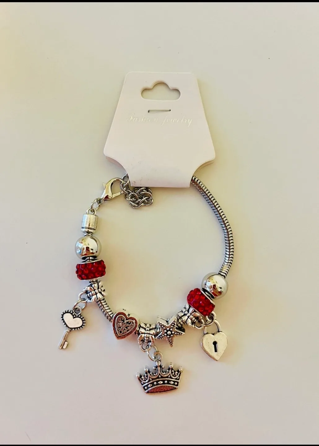 Charm Bracelet with Red Beads and Crown, Key,Heart Charms image indicator(2)