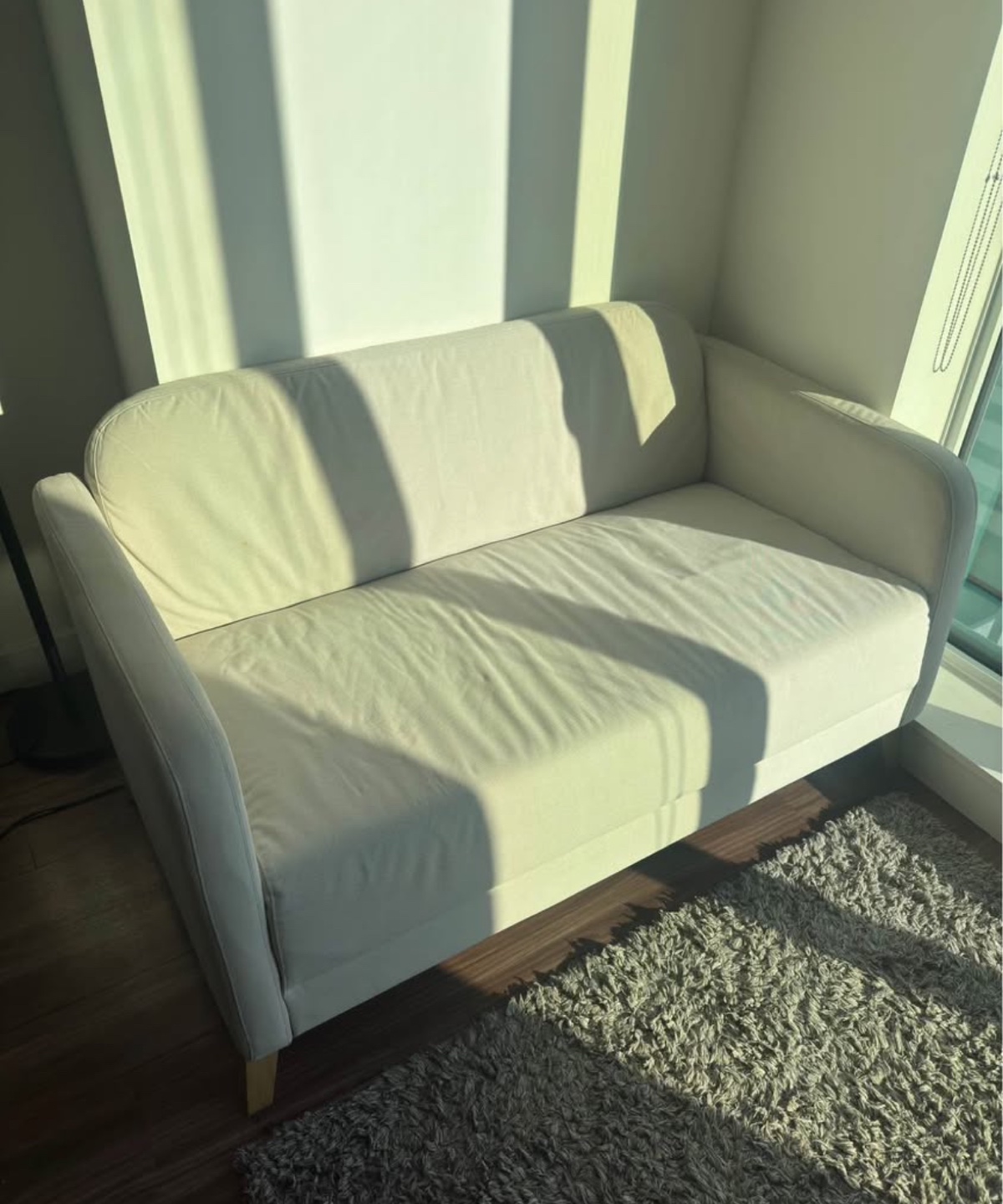 Off-White Two-Seater Sofa