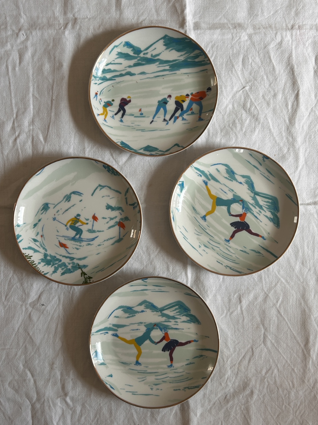 Set of 4 Anthropologie Winter Sports Dessert Plates