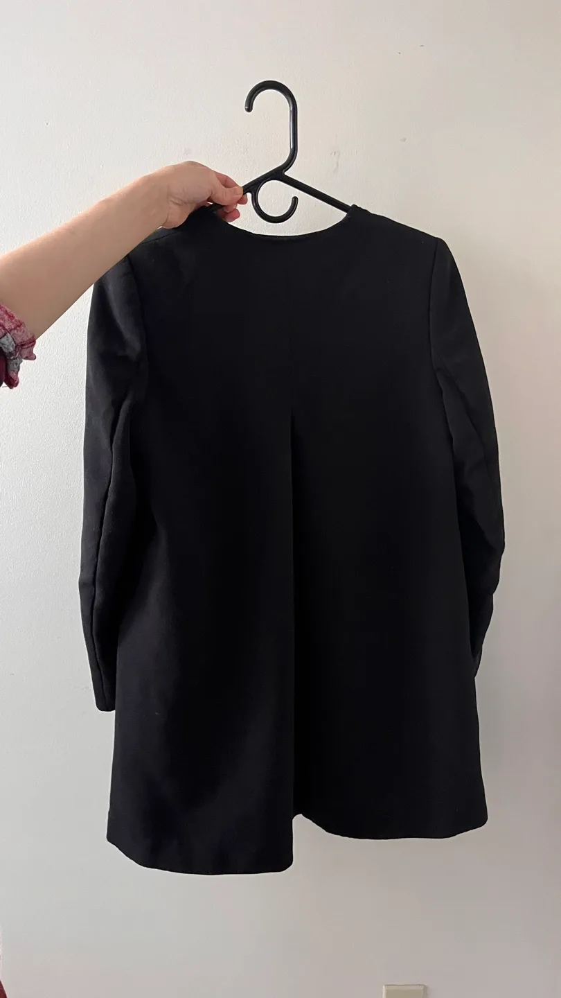 Black H&M jacket image indicator(2)