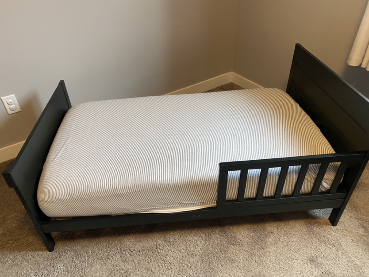 Toddler bed with mattress and guard rail