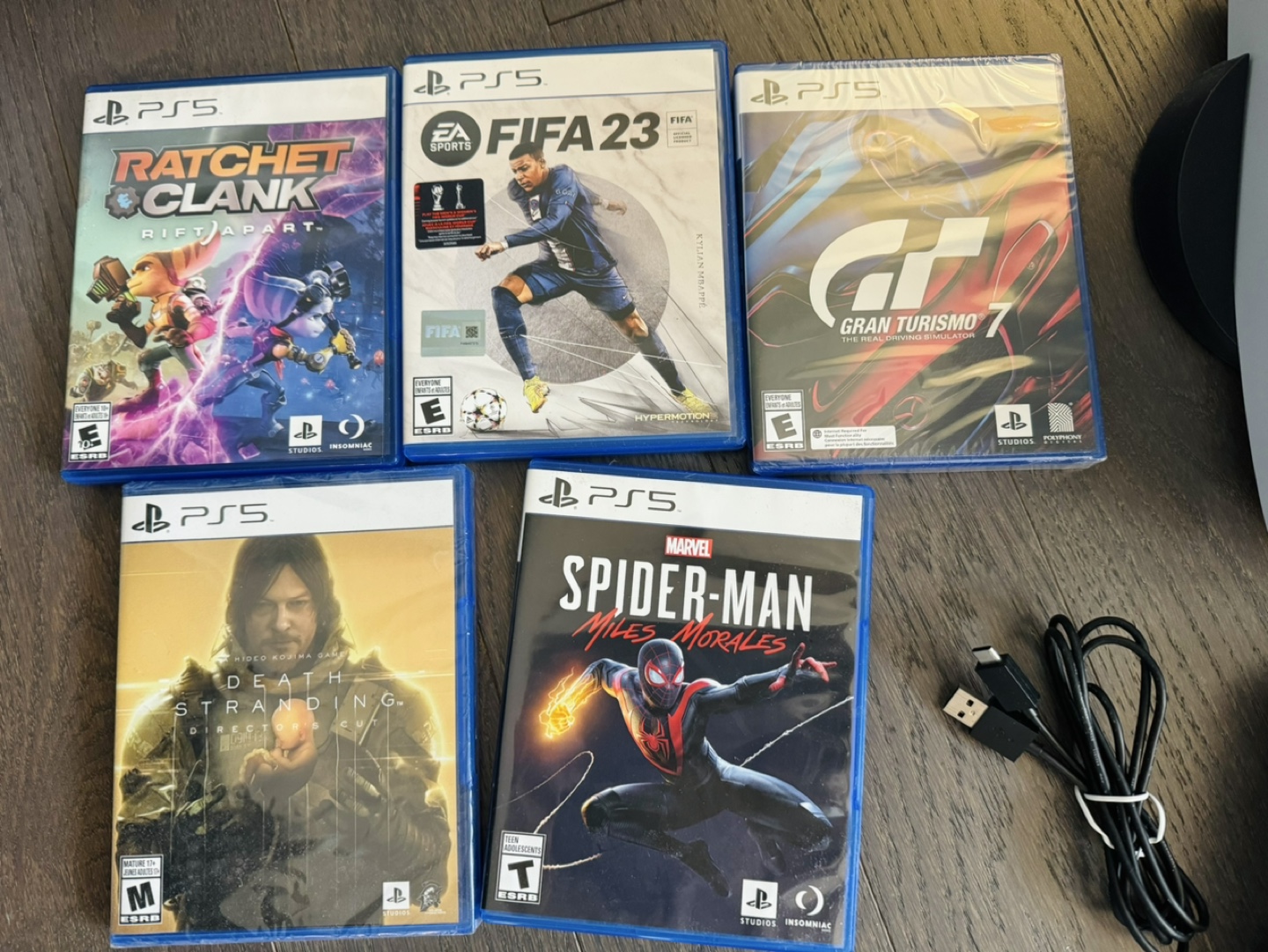 PS5 Console with 5 Games and Accessories - photo 2
