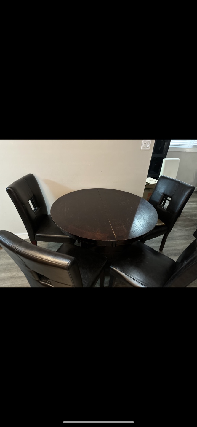 Free Table and Black Leather Chairs
