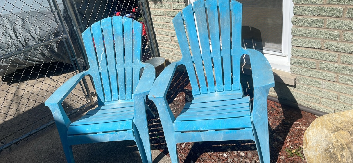 Pair of Blue Plastic Adirondack Chairs