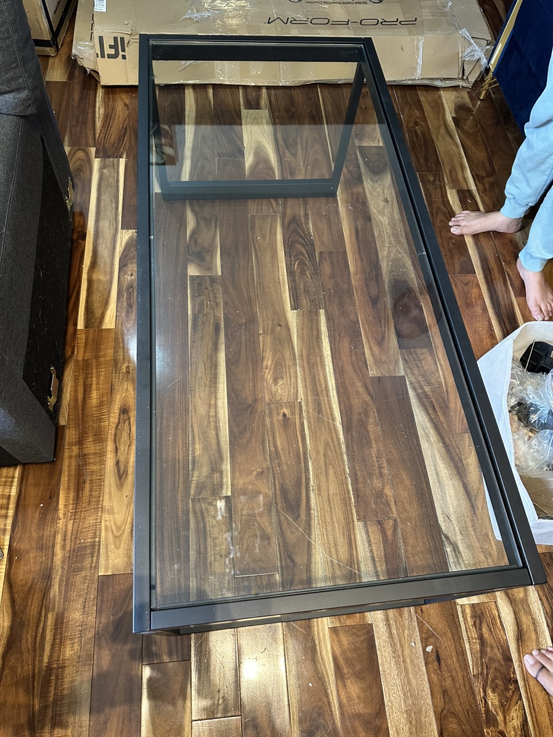 Glass-Top Coffee Table with Black Metal Frame