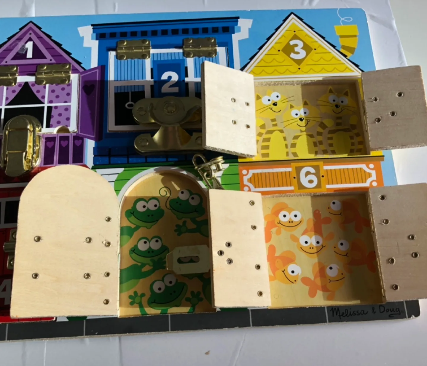 Melissa & Doug Wooden Latches Board image indicator(5)