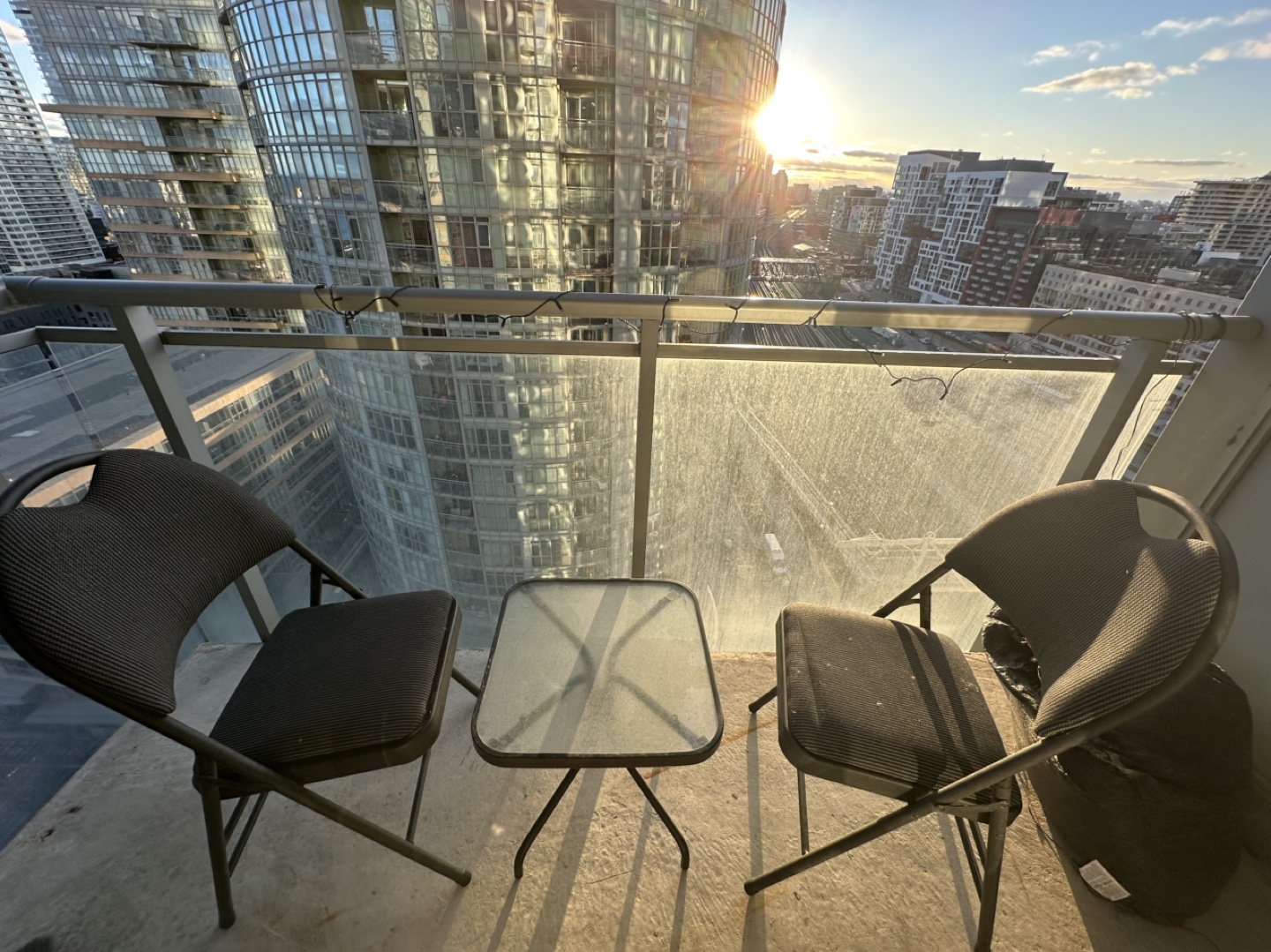 Two Folding Chairs and Glass Top Table Balcony Set