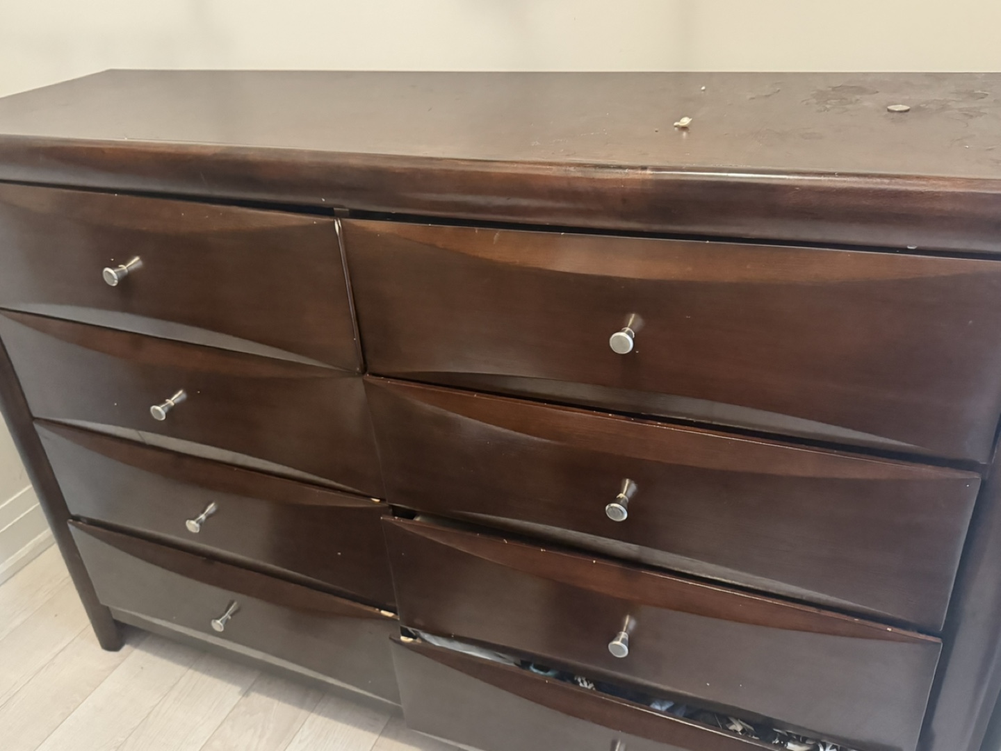 Dark brown dresser with six drawers