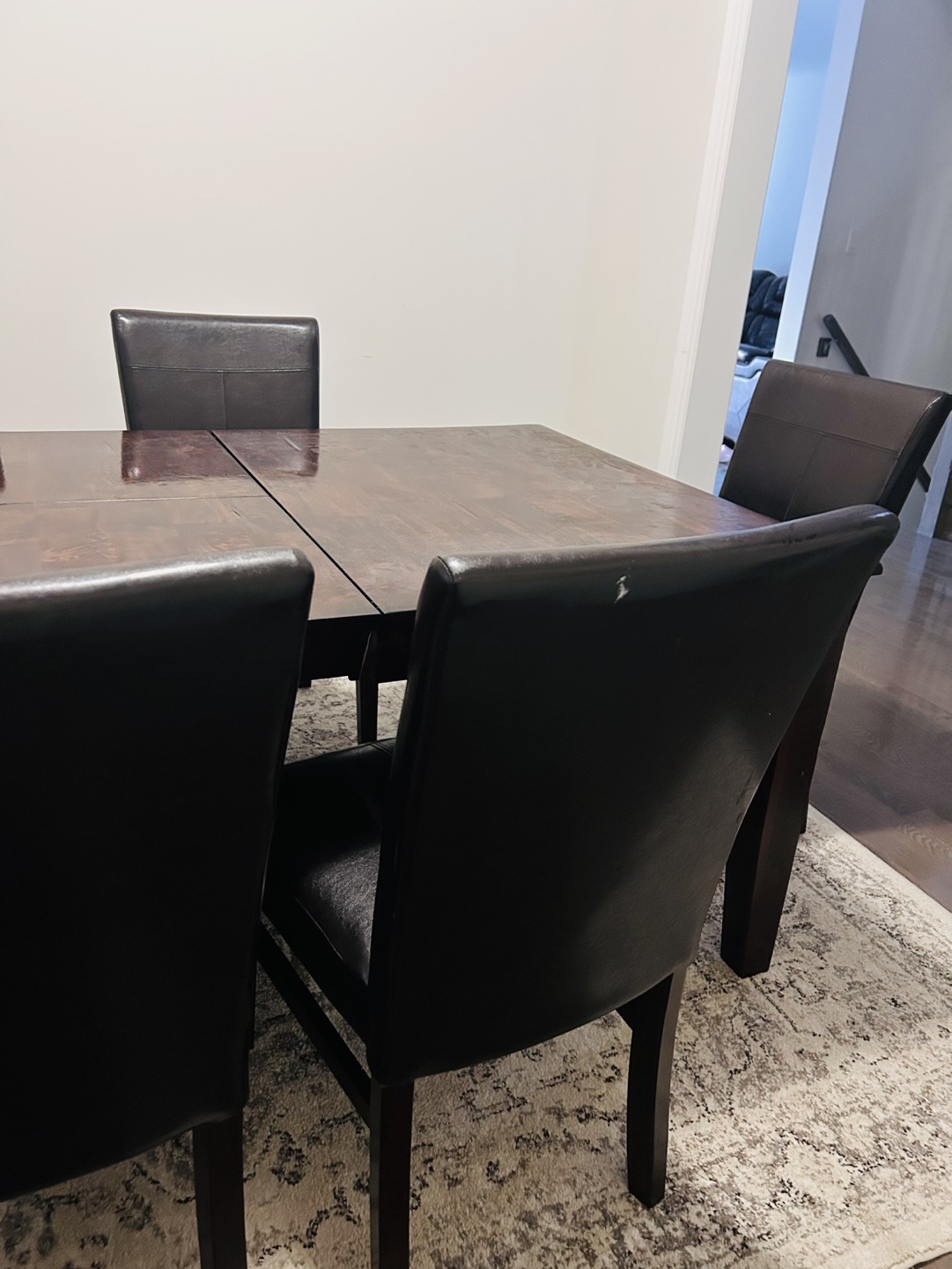 Dark Brown Wood Dining Table with Six Faux Leather Chairs