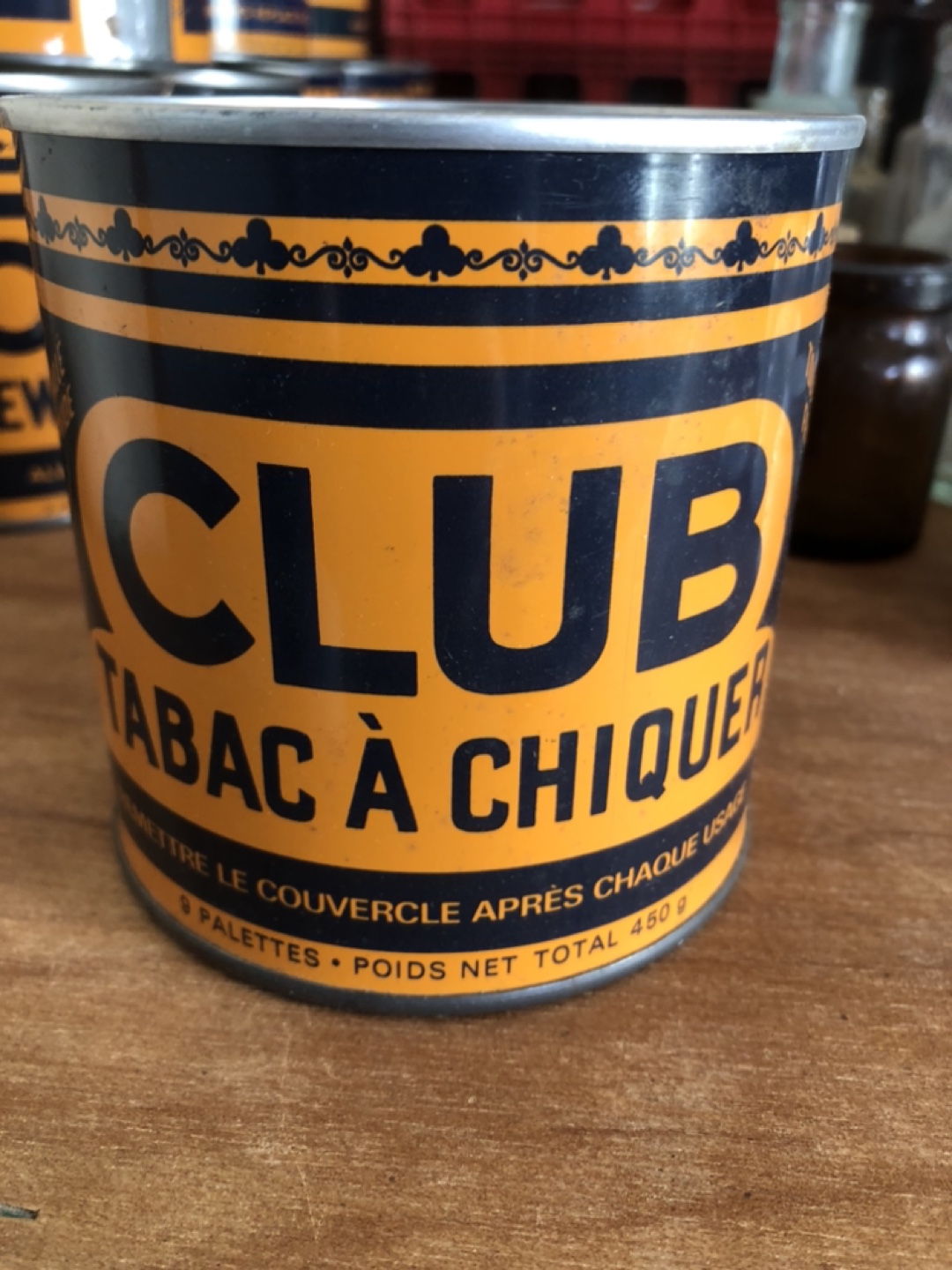 Nine Vintage Club Tins
