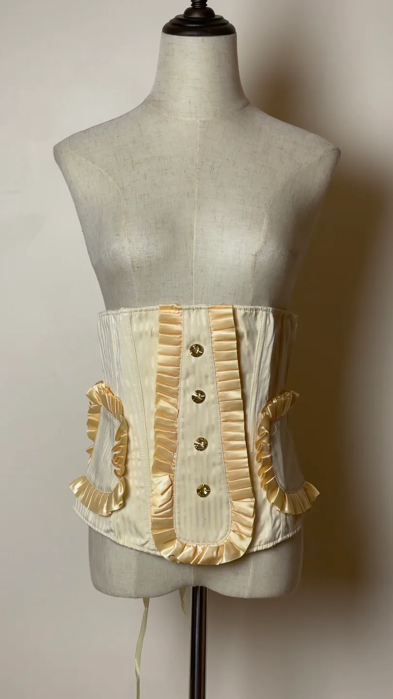 Cream coloured striped corset with ruffles thumbnail