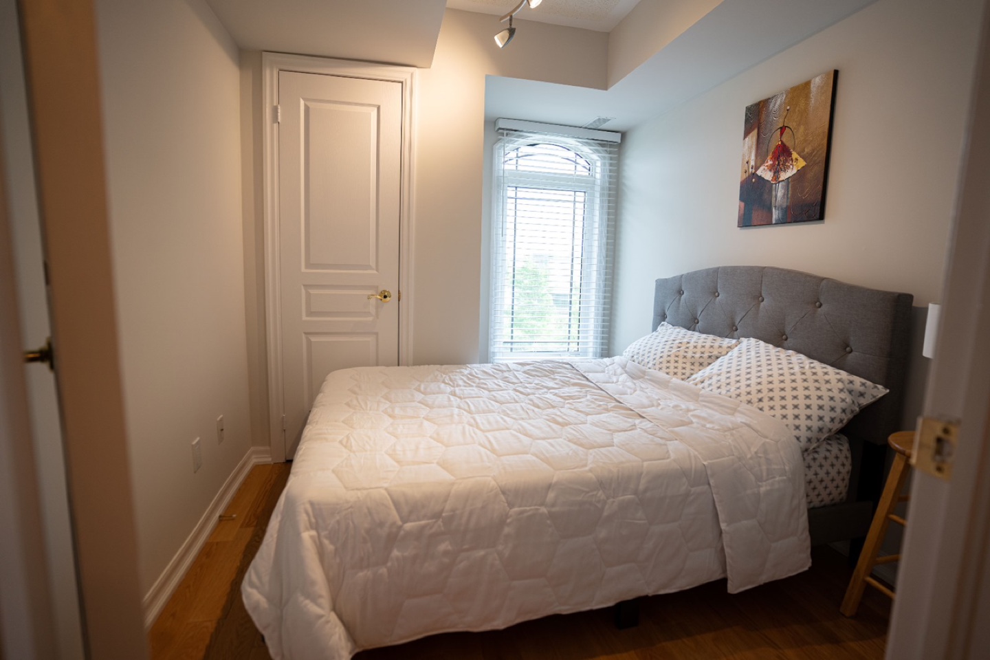 Full-size upholstered bed frame and mattress
