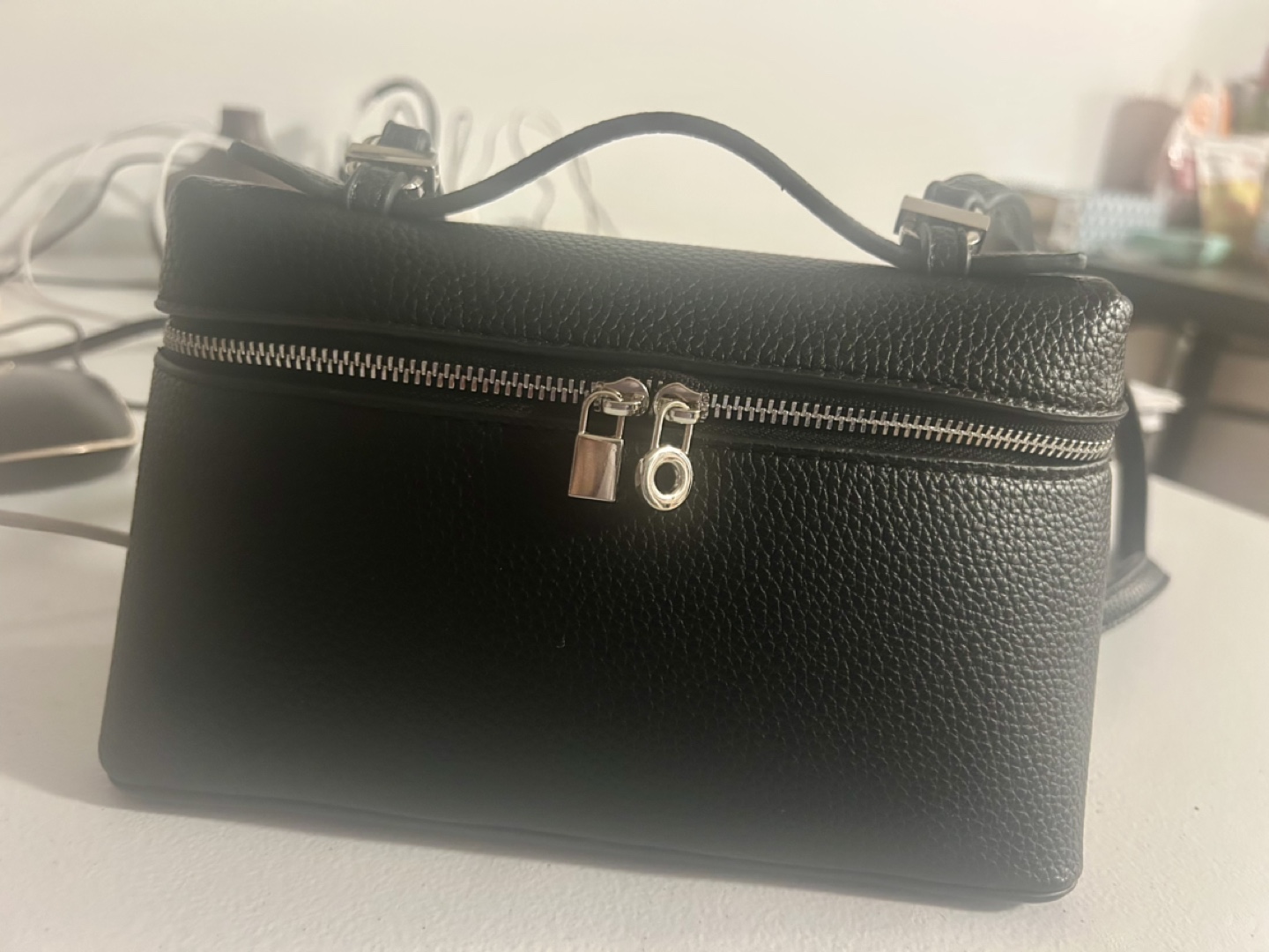 Black rectangular crossbody bag
