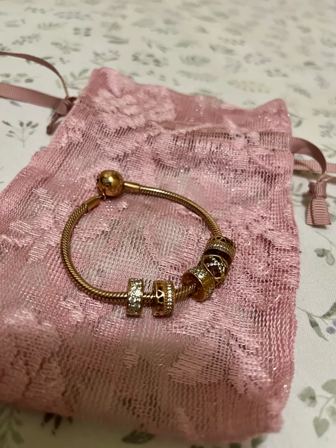 Pandora Rose Gold Bracelet with Charms thumbnail