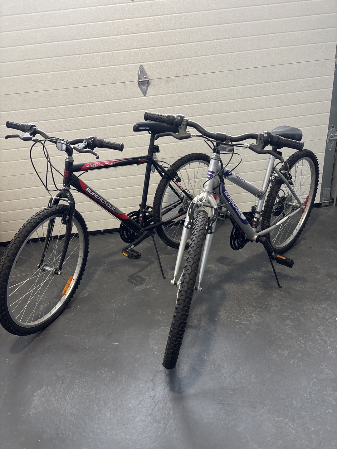 Two Supercycle Mountain Bikes