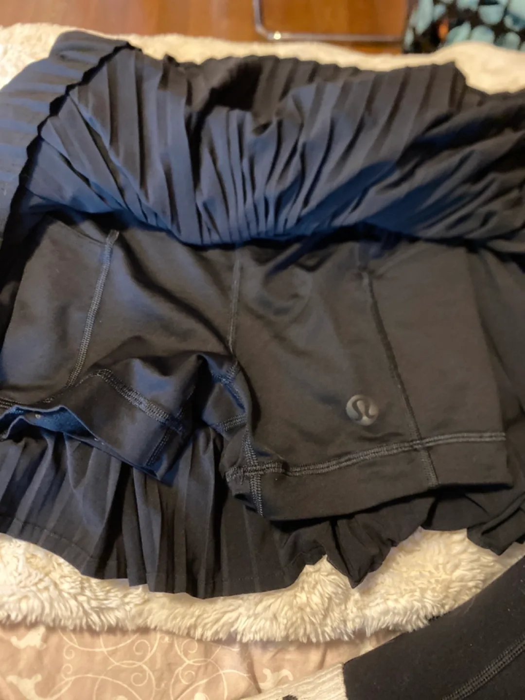 Lululemon Black Pleated Skirt Size 0 image indicator(4)