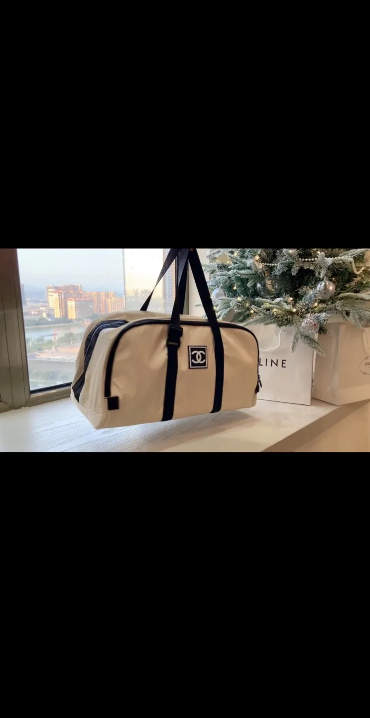 Chanel Beauté Beige and Black Duffel Bag image indicator(4)