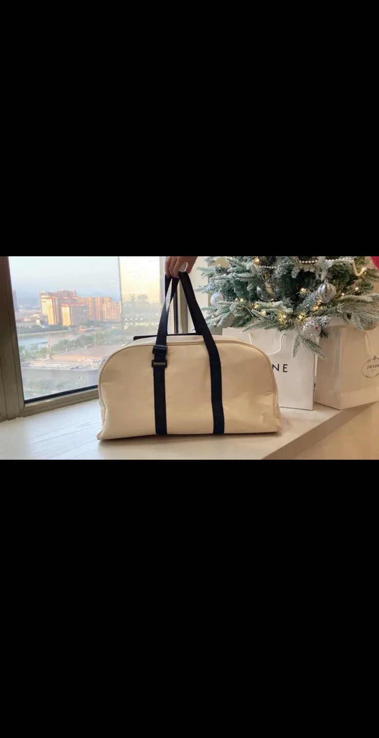 Chanel Beauté Beige and Black Duffel Bag image indicator(5)