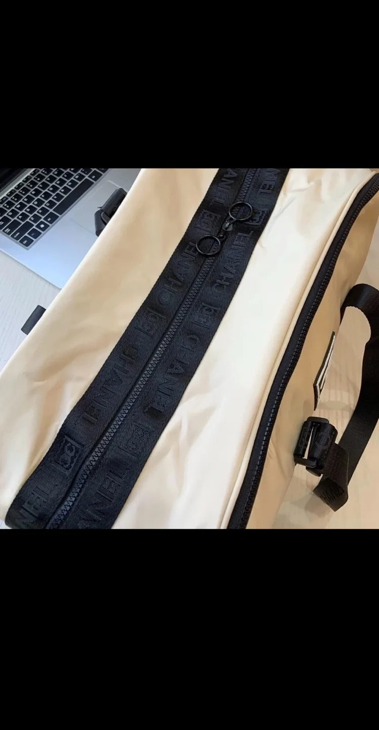 Chanel Beauté Beige and Black Duffel Bag image indicator(7)