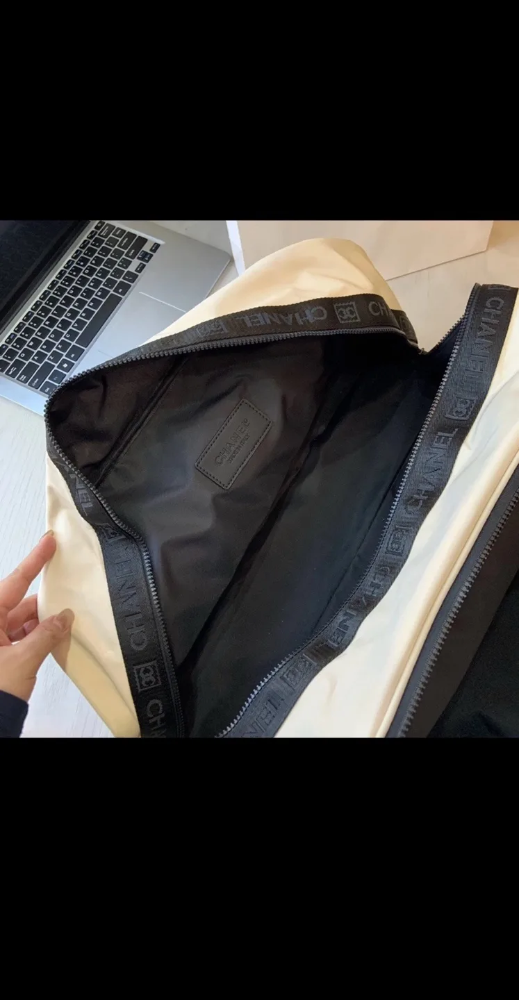 Chanel Beauté Beige and Black Duffel Bag image indicator(9)