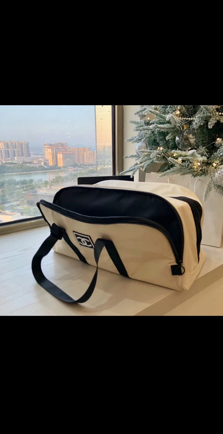 Chanel Beauté Beige and Black Duffel Bag image indicator(8)