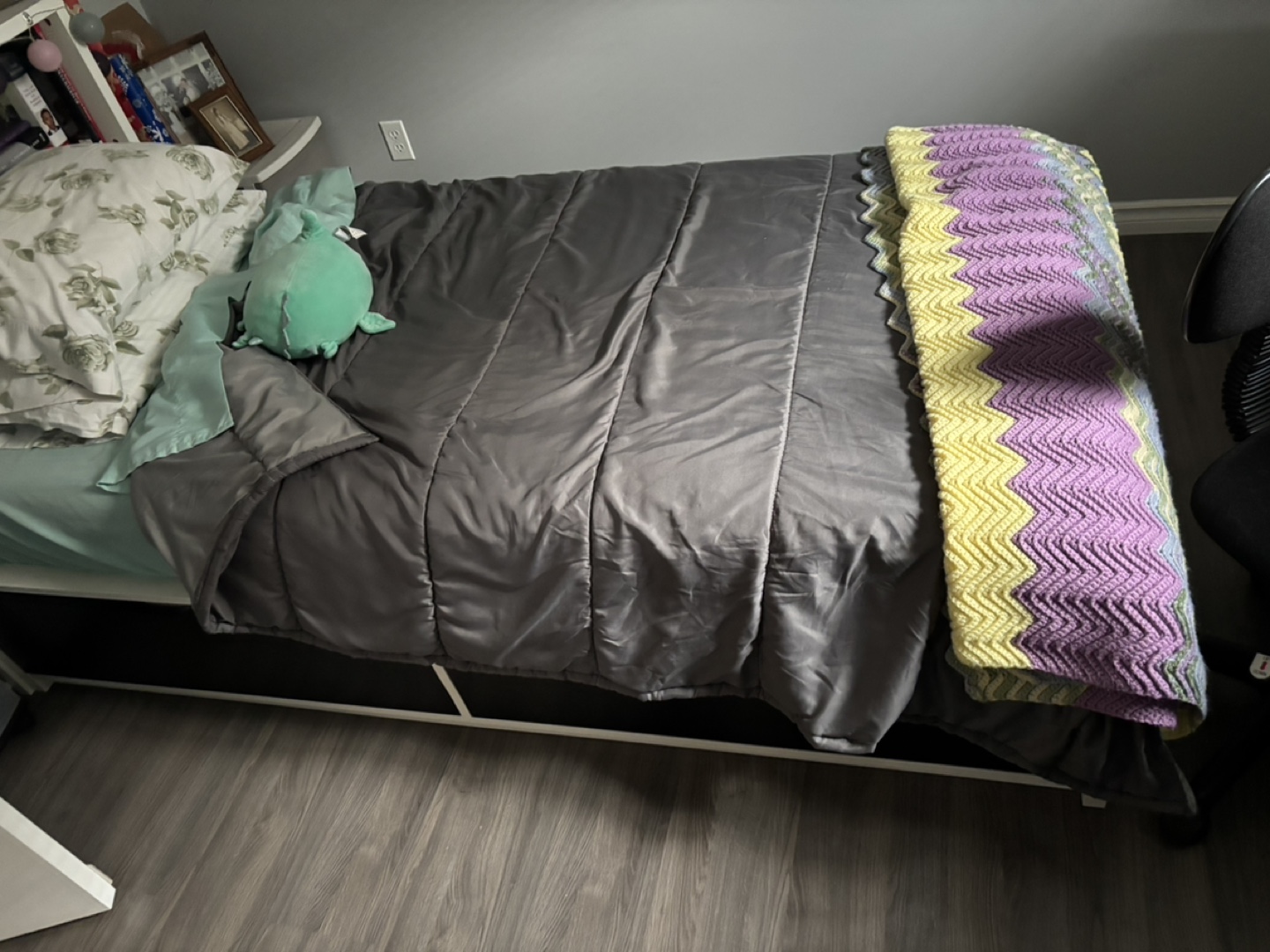 Twin-size bed frame with built-in shelves