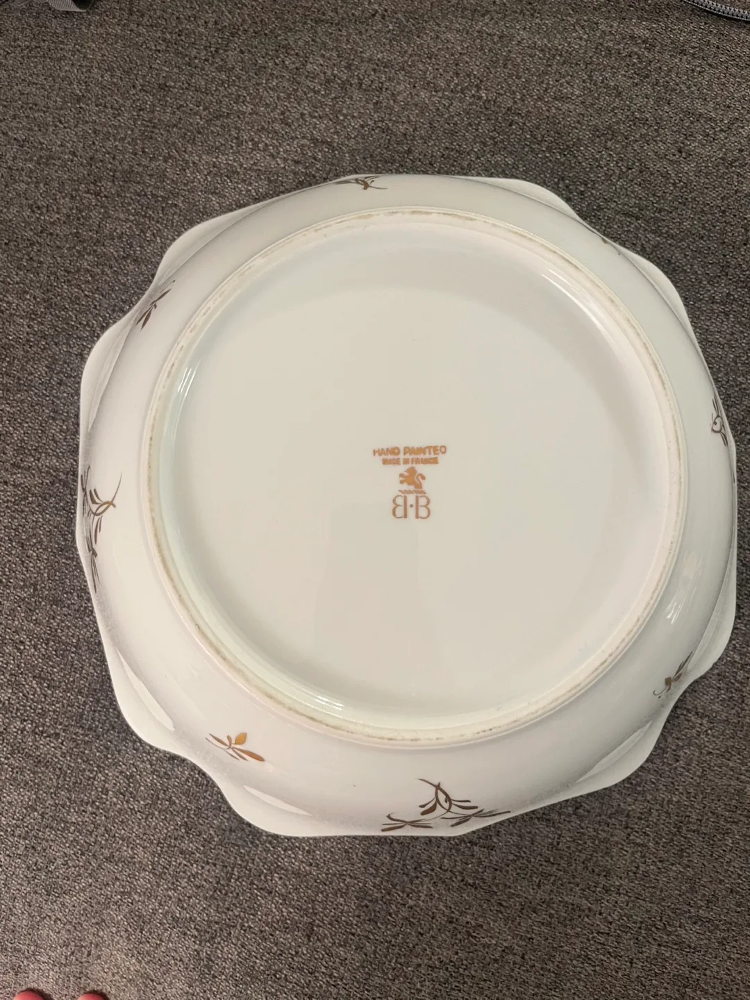 Gold-trimmed bowl, hand-painted floral design image indicator(3)