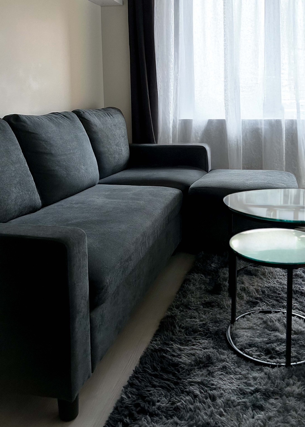 Sofa / Couch with Ottoman and reversible cushions.
